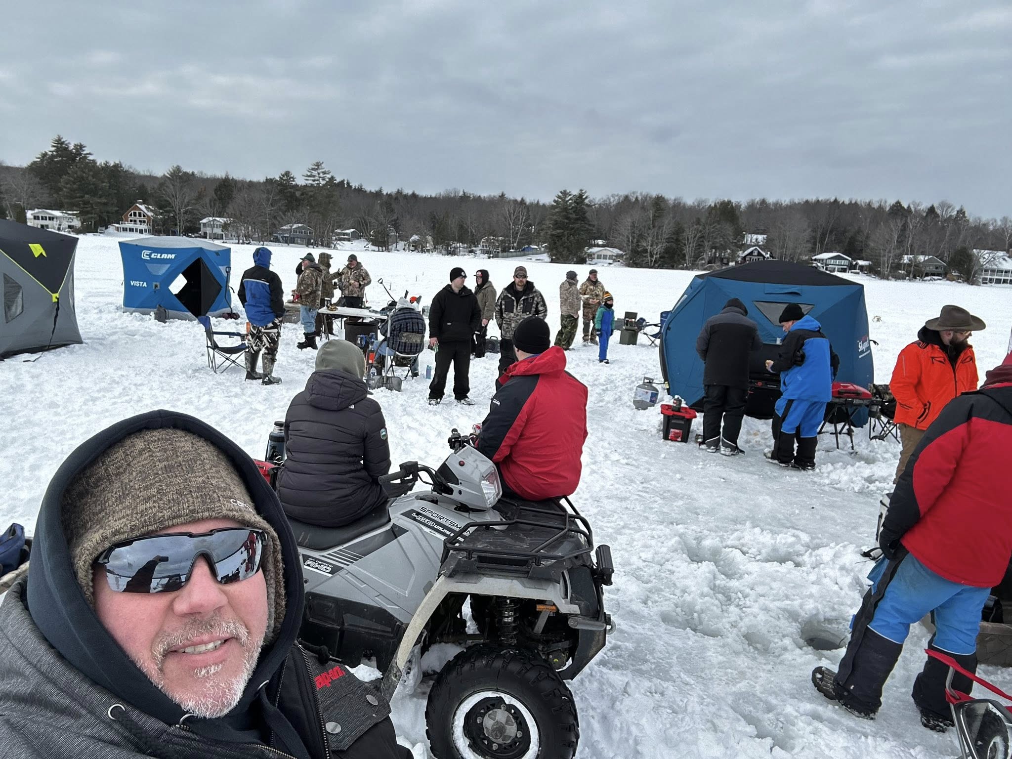 Fishing for Freedom ice fishing event — community gathering on the frozen lake